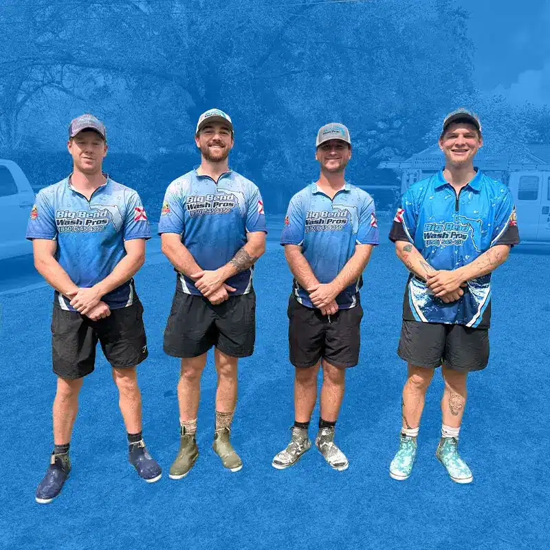 The Big Bend Wash Pros team in their blue company shirts